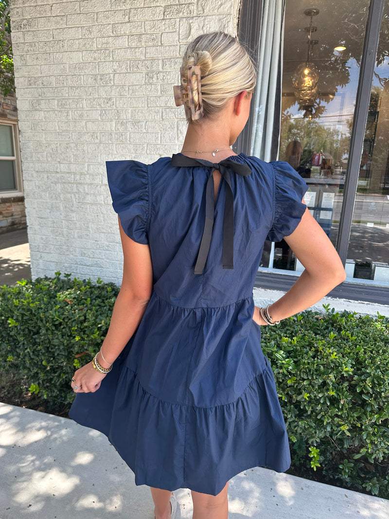 Navy Back Tie Flutter Dress